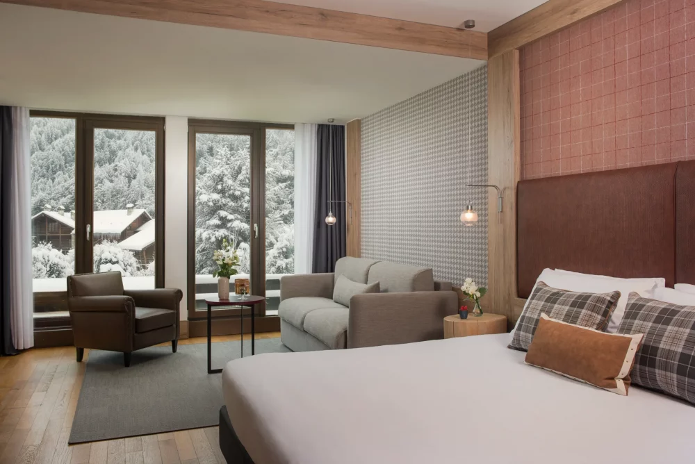 633032-NH-Collection-Alagna-Mirtillo-Rosso-Junior-Suite-aea3f6-original-1765546899-1000x668 - 3 escapadas con encanto para disfrutar de la nieve