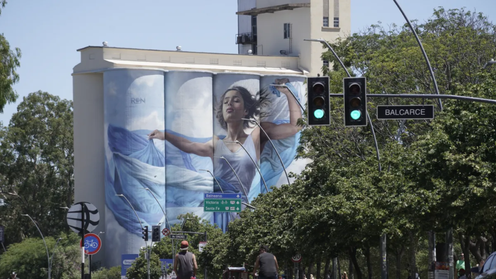 vientos-del-parana-mural-martin-Ron-1000x563 - Rosario: mesas con identidad propia, arquitectura y arte urbano a la vera del Paraná